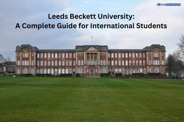 A photograph of Leeds Beckett University's Headingley Campus.  It is set behind a wide, flat green lawn under a slightly overcast sky. Text at the top of the image reads, 